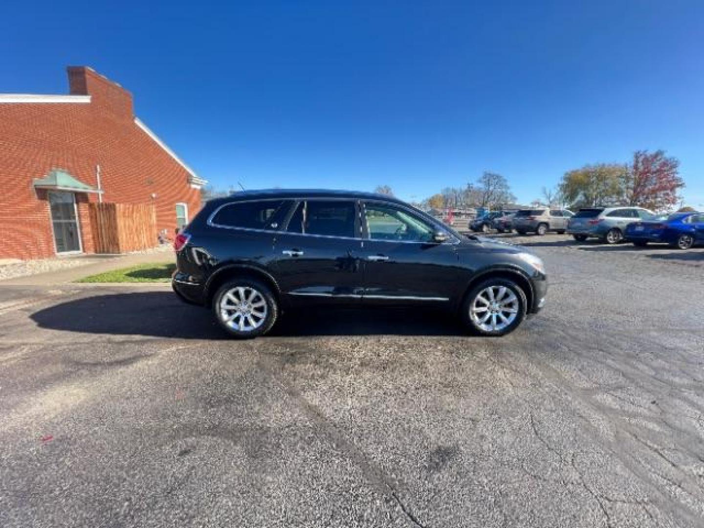 2015 Carbon Black Metallic Buick Enclave Premium FWD (5GAKRCKD4FJ) with an 3.6L V6 DOHC 24V engine, 6-Speed Automatic Overdrive transmission, located at 1951 S Dayton Lakeview Rd., New Carlisle, OH, 45344, (937) 908-9800, 39.890999, -84.050255 - Photo#5