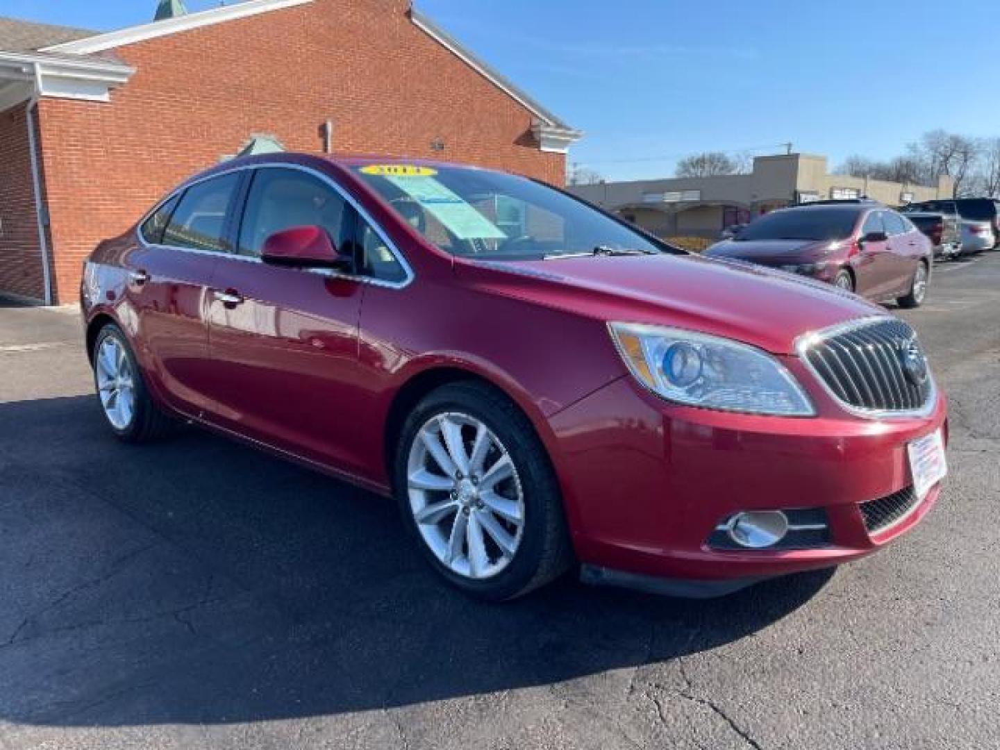 2015 Crystal Red Tintcoat Buick Verano Leather (1G4PS5SK5F4) with an 2.4L L4 DOHC 16V FFV engine, 6-Speed Automatic transmission, located at 1184 Kauffman Ave, Fairborn, OH, 45324, (937) 908-9800, 39.807072, -84.030914 - Photo#0