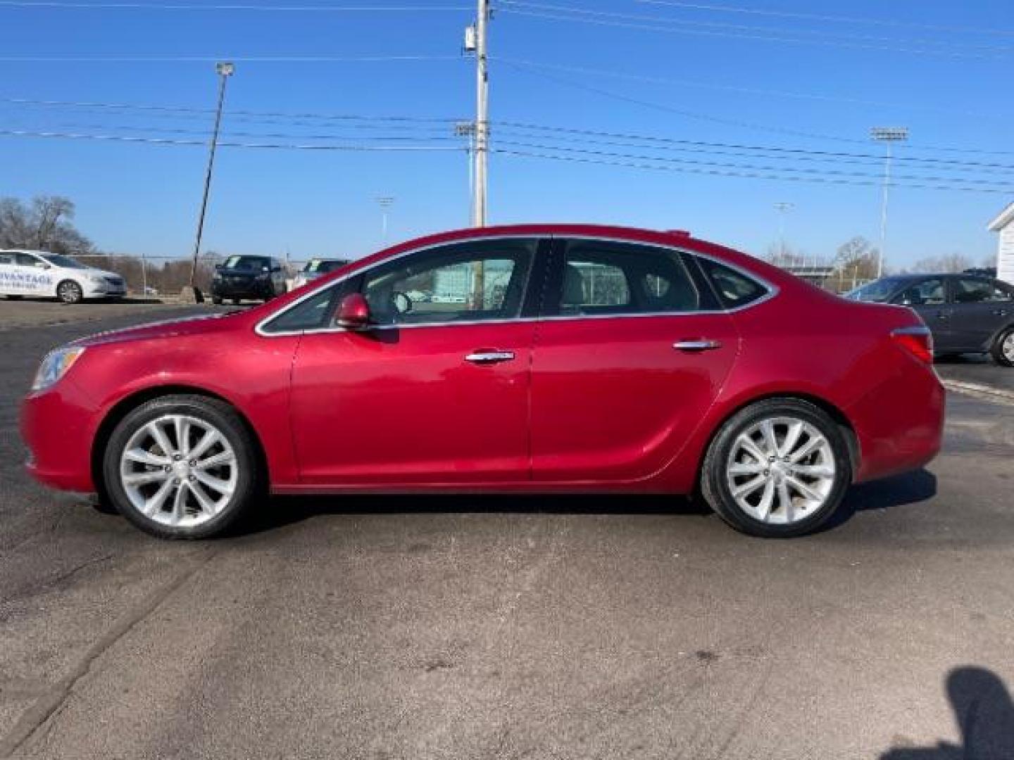 2015 Crystal Red Tintcoat Buick Verano Leather (1G4PS5SK5F4) with an 2.4L L4 DOHC 16V FFV engine, 6-Speed Automatic transmission, located at 1184 Kauffman Ave, Fairborn, OH, 45324, (937) 908-9800, 39.807072, -84.030914 - Photo#2