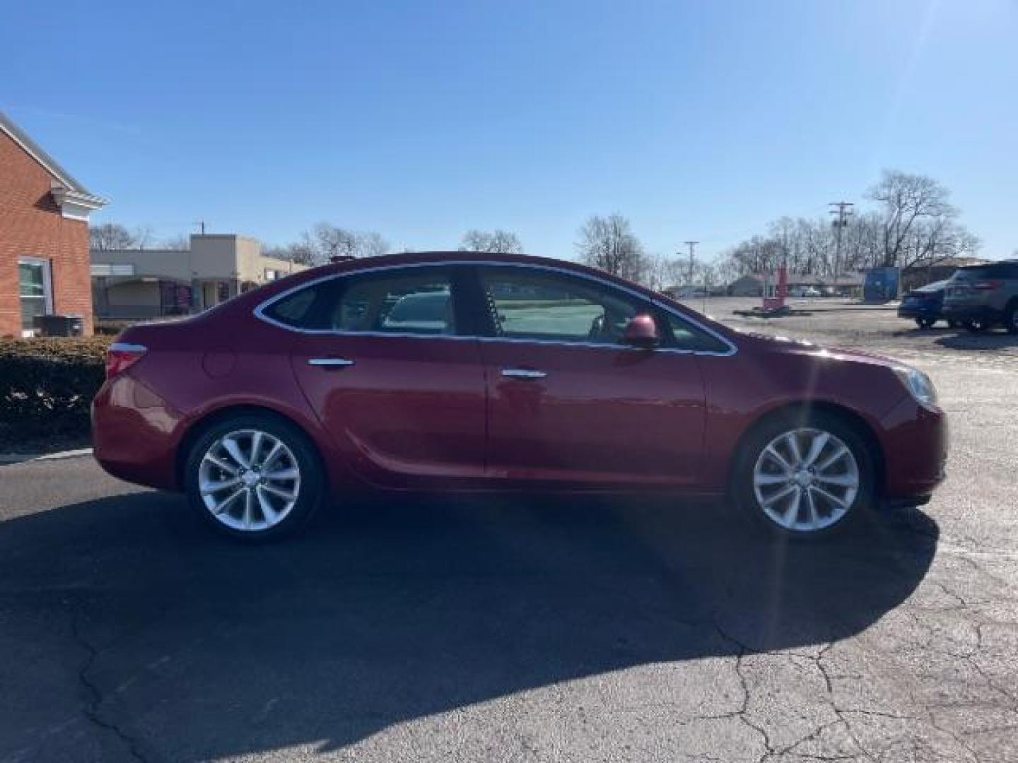 2015 Crystal Red Tintcoat Buick Verano Leather (1G4PS5SK5F4) with an 2.4L L4 DOHC 16V FFV engine, 6-Speed Automatic transmission, located at 1184 Kauffman Ave, Fairborn, OH, 45324, (937) 908-9800, 39.807072, -84.030914 - Photo#3