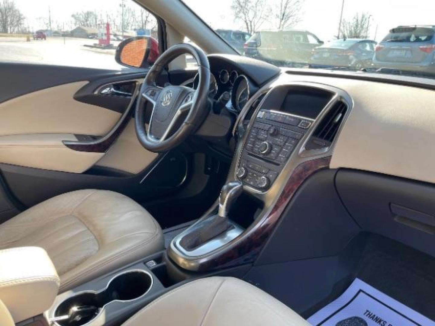 2015 Crystal Red Tintcoat Buick Verano Leather (1G4PS5SK5F4) with an 2.4L L4 DOHC 16V FFV engine, 6-Speed Automatic transmission, located at 1184 Kauffman Ave, Fairborn, OH, 45324, (937) 908-9800, 39.807072, -84.030914 - Photo#8