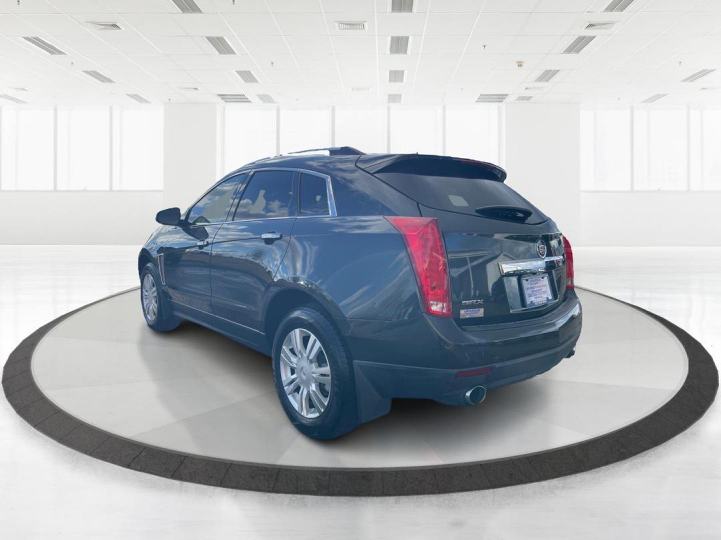 2015 Graphite Metallic Cadillac SRX Luxury Collection FWD (3GYFNBE3XFS) with an 3.6L V6 DOHC 24V FFV engine, 6-Speed Automatic transmission, located at 880 E. National Road, Vandalia, OH, 45377, (937) 908-9800, 39.891918, -84.183594 - Photo#4