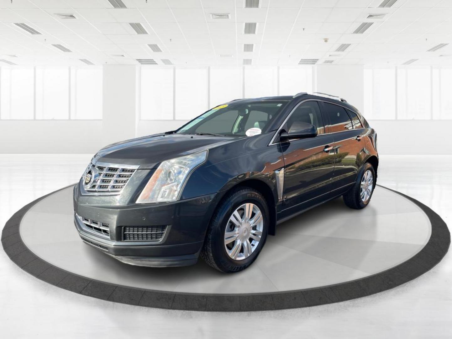 2015 Graphite Metallic Cadillac SRX Luxury Collection FWD (3GYFNBE3XFS) with an 3.6L V6 DOHC 24V FFV engine, 6-Speed Automatic transmission, located at 880 E. National Road, Vandalia, OH, 45377, (937) 908-9800, 39.891918, -84.183594 - Photo#7