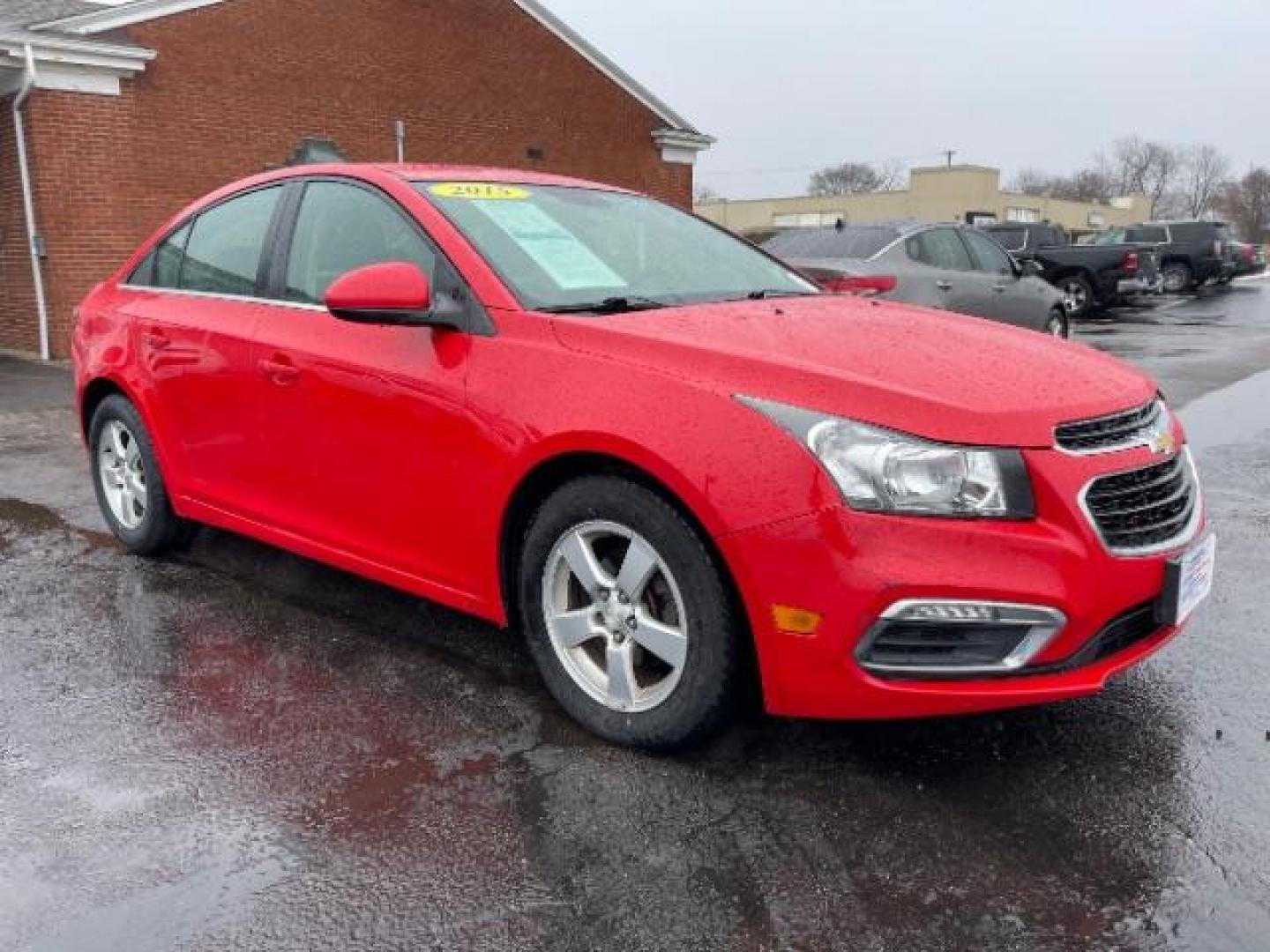 2015 Red Hot Chevrolet Cruze 1LT Auto (1G1PC5SB5F7) with an 1.4L L4 DOHC 16V TURBO engine, 6-Speed Automatic transmission, located at 1184 Kauffman Ave, Fairborn, OH, 45324, (937) 908-9800, 39.807072, -84.030914 - Photo#0