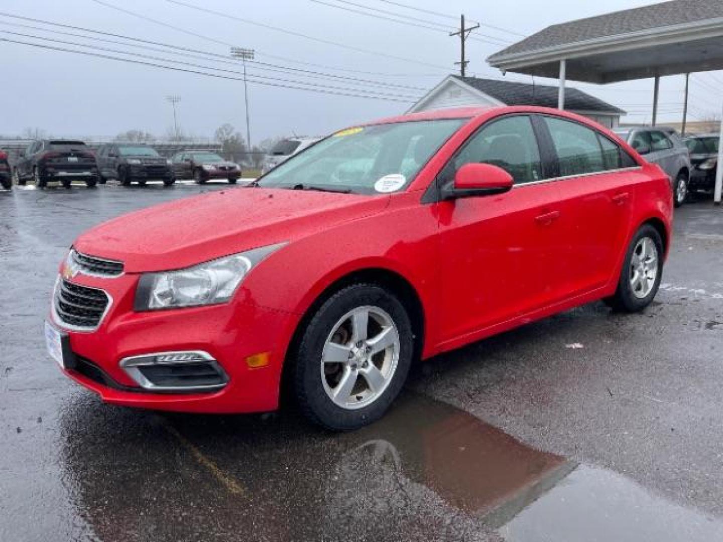 2015 Red Hot Chevrolet Cruze 1LT Auto (1G1PC5SB5F7) with an 1.4L L4 DOHC 16V TURBO engine, 6-Speed Automatic transmission, located at 1184 Kauffman Ave, Fairborn, OH, 45324, (937) 908-9800, 39.807072, -84.030914 - Photo#1