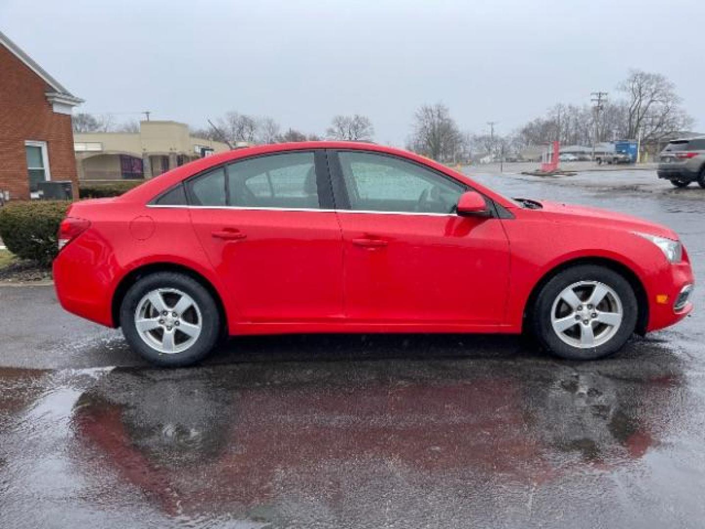 2015 Red Hot Chevrolet Cruze 1LT Auto (1G1PC5SB5F7) with an 1.4L L4 DOHC 16V TURBO engine, 6-Speed Automatic transmission, located at 1184 Kauffman Ave, Fairborn, OH, 45324, (937) 908-9800, 39.807072, -84.030914 - Photo#3