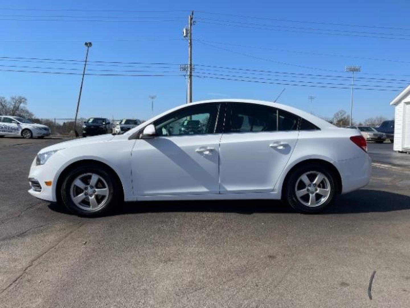 2015 Summit White Chevrolet Cruze 1LT Auto (1G1PC5SB0F7) with an 1.4L L4 DOHC 16V TURBO engine, 6-Speed Automatic transmission, located at 1951 S Dayton Lakeview Rd., New Carlisle, OH, 45344, (937) 908-9800, 39.890999, -84.050255 - Photo#2