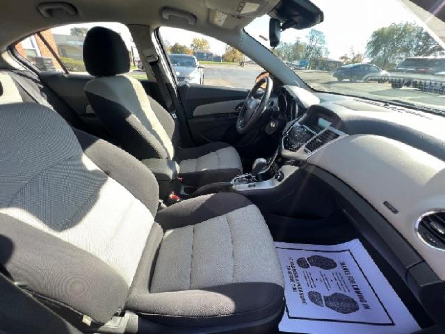 2015 Black Granite Metallic Chevrolet Cruze LS Auto (1G1PA5SHXF7) with an 1.8L L4 DOHC 16V FFV engine, 6-Speed Automatic transmission, located at 880 E. National Road, Vandalia, OH, 45377, (937) 908-9800, 39.891918, -84.183594 - Photo#9