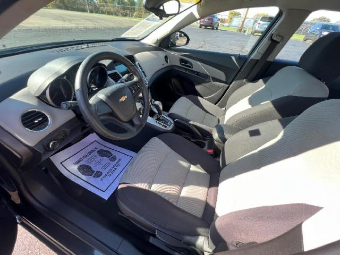 2015 Black Granite Metallic Chevrolet Cruze LS Auto (1G1PA5SHXF7) with an 1.8L L4 DOHC 16V FFV engine, 6-Speed Automatic transmission, located at 880 E. National Road, Vandalia, OH, 45377, (937) 908-9800, 39.891918, -84.183594 - Photo#6