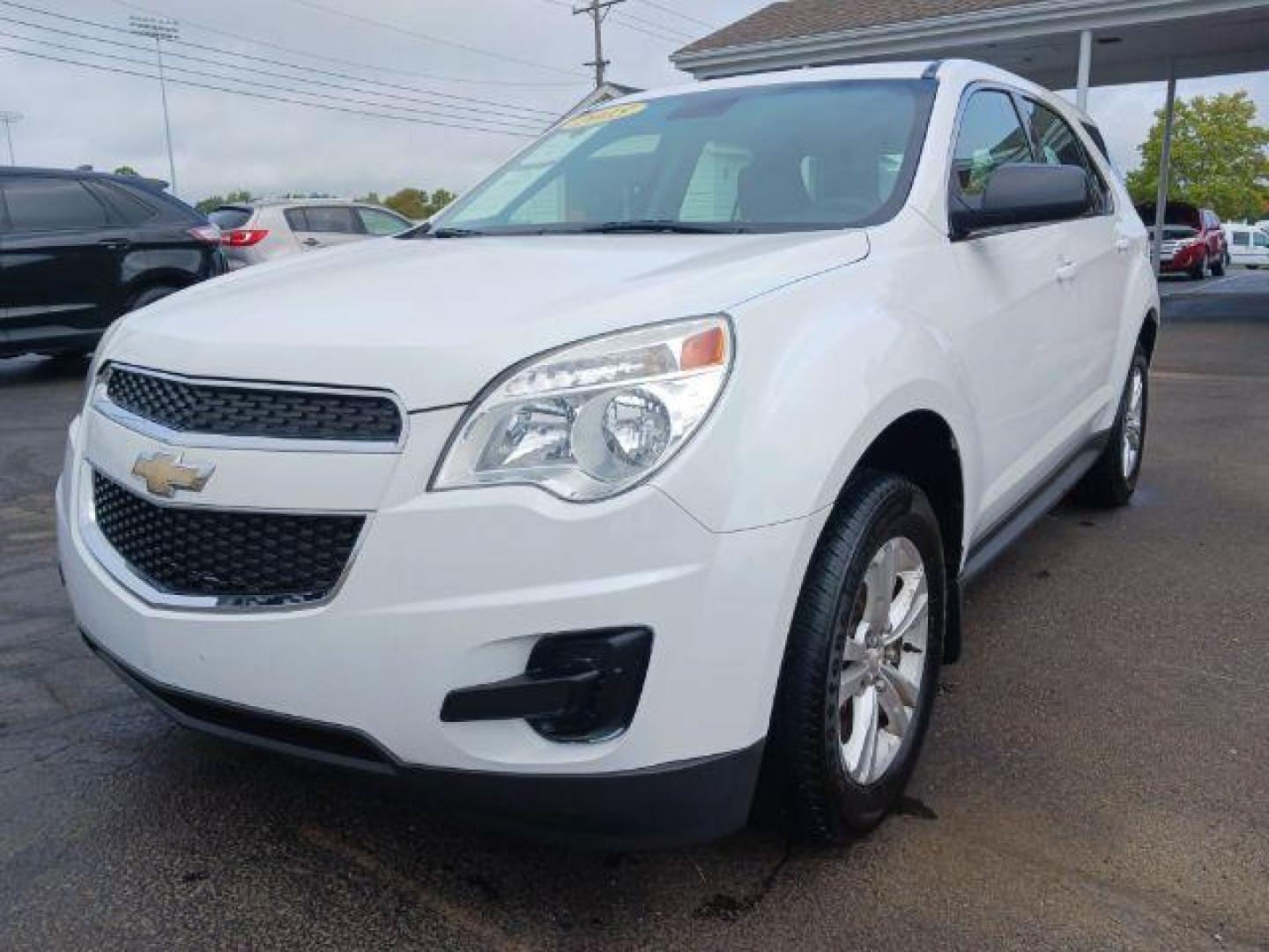 2015 Summit White Chevrolet Equinox LS 2WD (2GNALAEK4F1) with an 2.4L L4 DOHC 16V FFV engine, 6-Speed Automatic transmission, located at 1951 S Dayton Lakeview Rd., New Carlisle, OH, 45344, (937) 908-9800, 39.890999, -84.050255 - 2015 Chevrolet Equinox LS 2WD - Photo#14