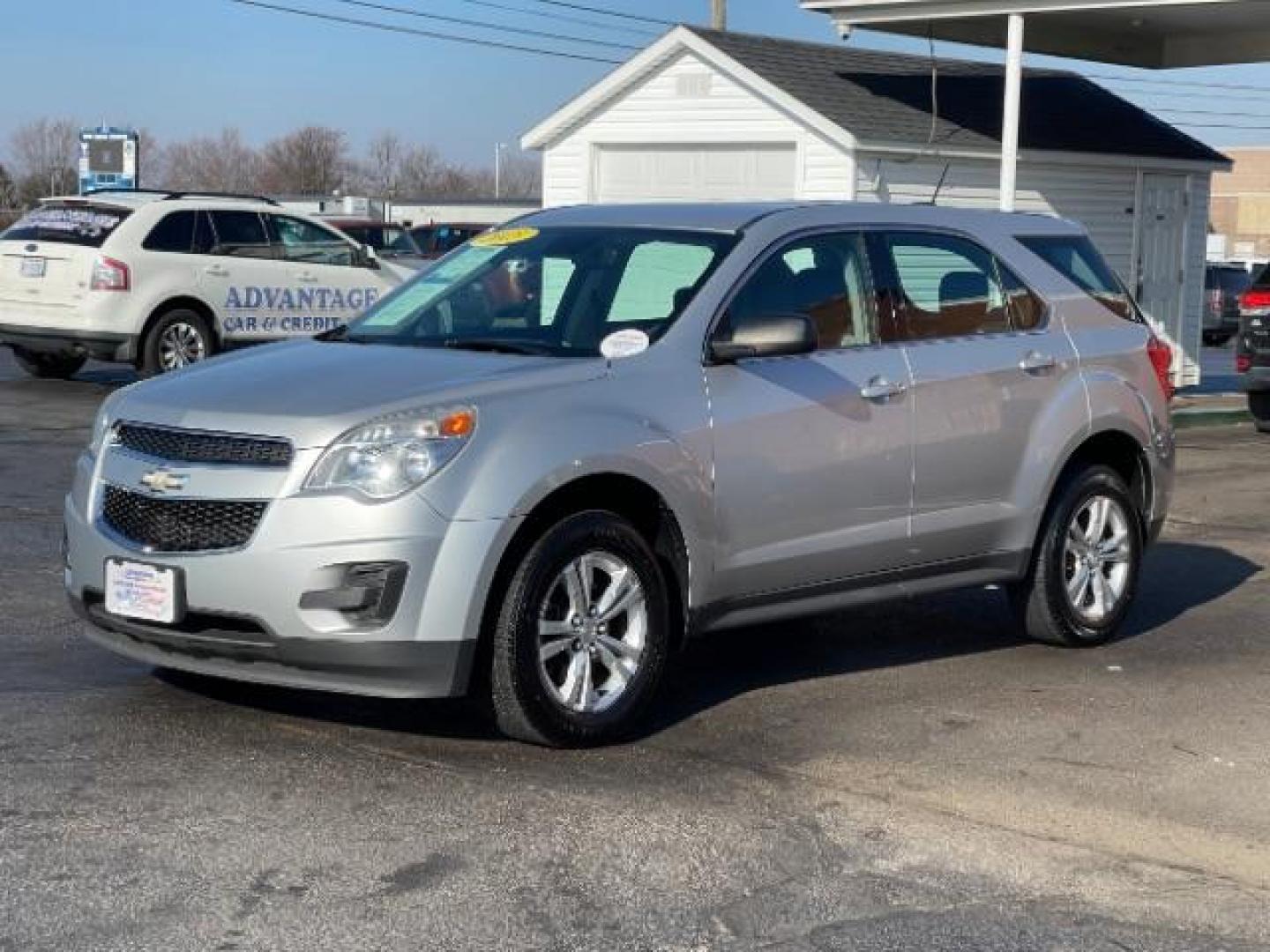 2015 Silver Ice Metallic Chevrolet Equinox LS AWD (2GNFLEEK3F6) with an 2.4L L4 DOHC 16V FFV engine, 6-Speed Automatic transmission, located at 401 Woodman Dr, Riverside, OH, 45431, (937) 908-9800, 39.760899, -84.123421 - Photo#2