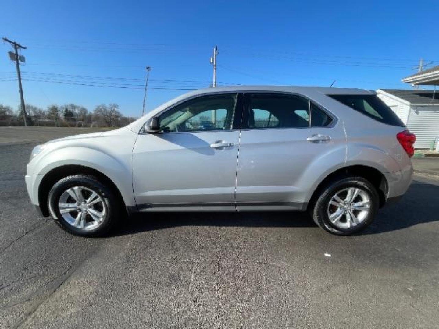 2015 Silver Ice Metallic Chevrolet Equinox LS AWD (2GNFLEEK3F6) with an 2.4L L4 DOHC 16V FFV engine, 6-Speed Automatic transmission, located at 401 Woodman Dr, Riverside, OH, 45431, (937) 908-9800, 39.760899, -84.123421 - Photo#4