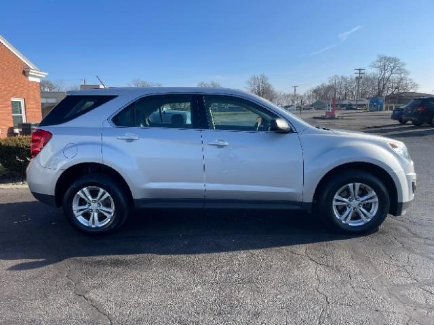 2015 Silver Ice Metallic Chevrolet Equinox LS AWD (2GNFLEEK3F6) with an 2.4L L4 DOHC 16V FFV engine, 6-Speed Automatic transmission, located at 401 Woodman Dr, Riverside, OH, 45431, (937) 908-9800, 39.760899, -84.123421 - Photo#6