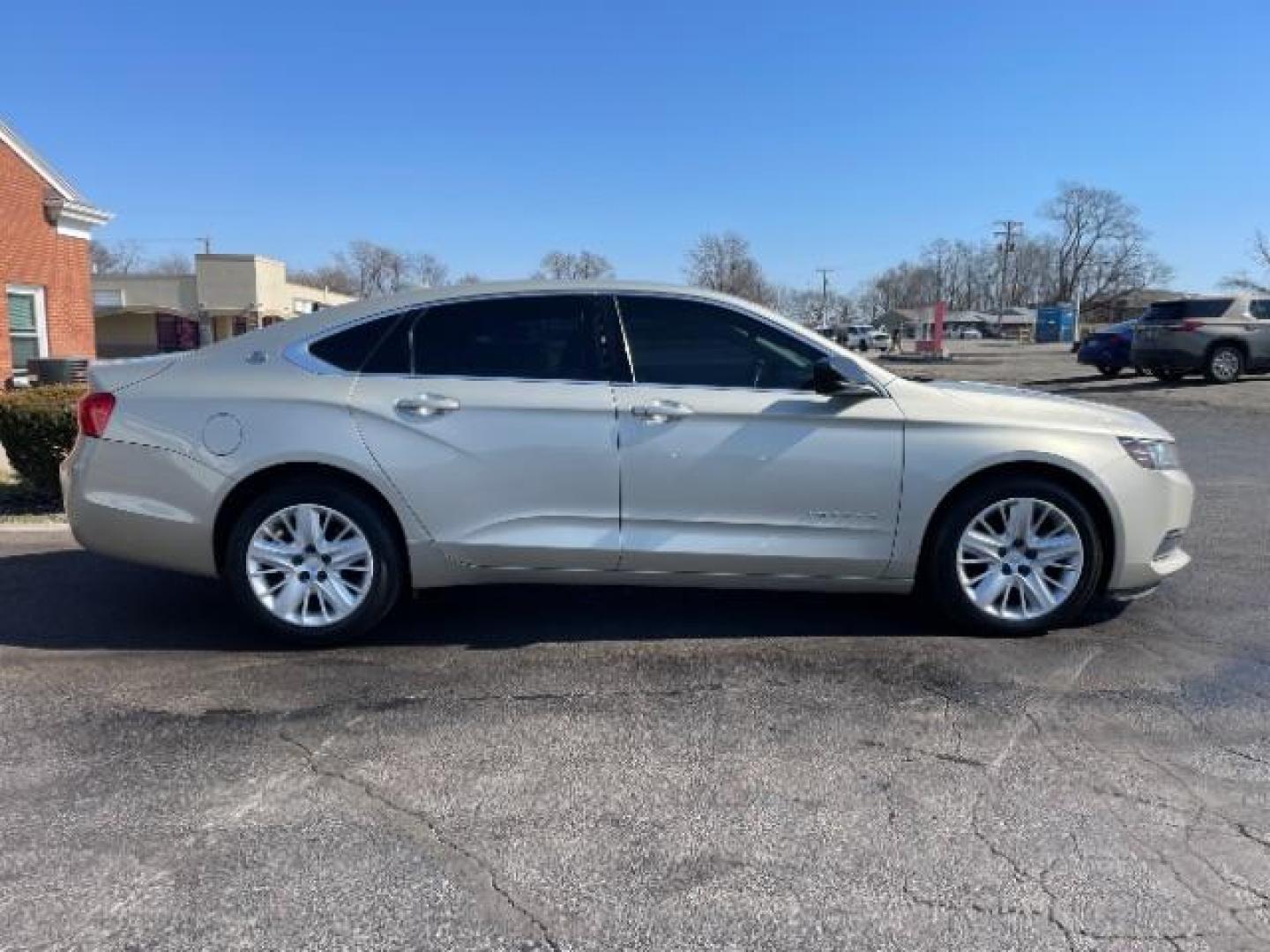 2015 Champagne Silver Metallic Chevrolet Impala LS (2G11Z5SL2F9) with an 2.5L L4 DOHC 16V engine, 6-Speed Automatic transmission, located at 1184 Kauffman Ave, Fairborn, OH, 45324, (937) 908-9800, 39.807072, -84.030914 - Photo#3