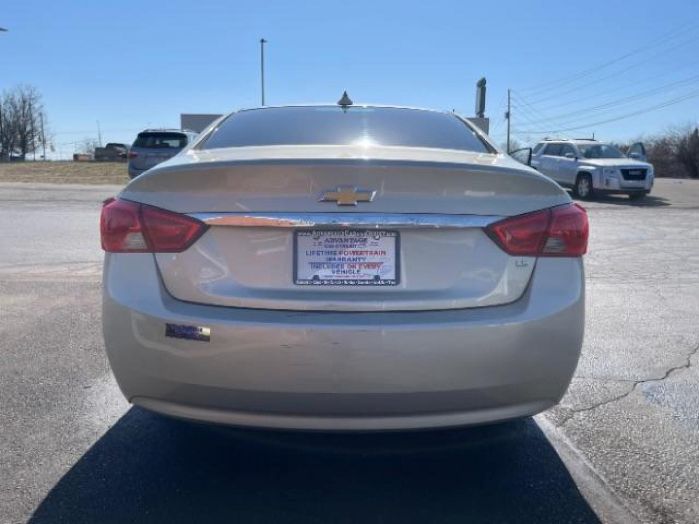 2015 Champagne Silver Metallic Chevrolet Impala LS (2G11Z5SL2F9) with an 2.5L L4 DOHC 16V engine, 6-Speed Automatic transmission, located at 1184 Kauffman Ave, Fairborn, OH, 45324, (937) 908-9800, 39.807072, -84.030914 - Photo#5