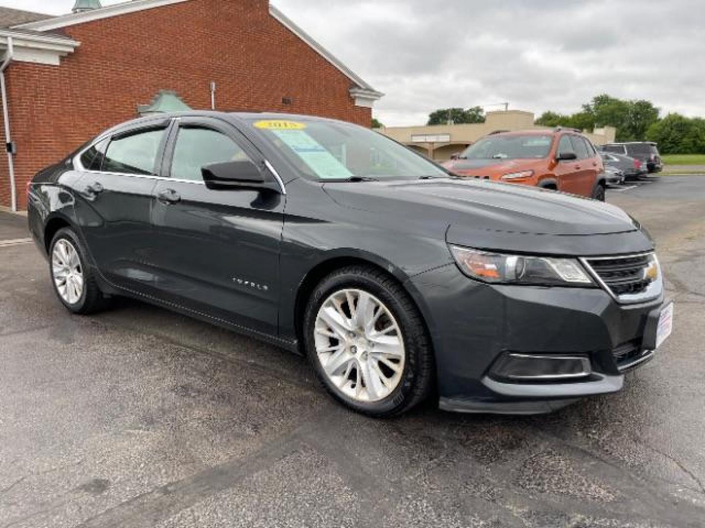 2015 Black Chevrolet Impala LS (2G11Z5SL6F9) with an 2.5L L4 DOHC 16V engine, 6-Speed Automatic transmission, located at 1099 N County Rd 25A , Troy, OH, 45373, (937) 908-9800, 40.057079, -84.212883 - Photo#0