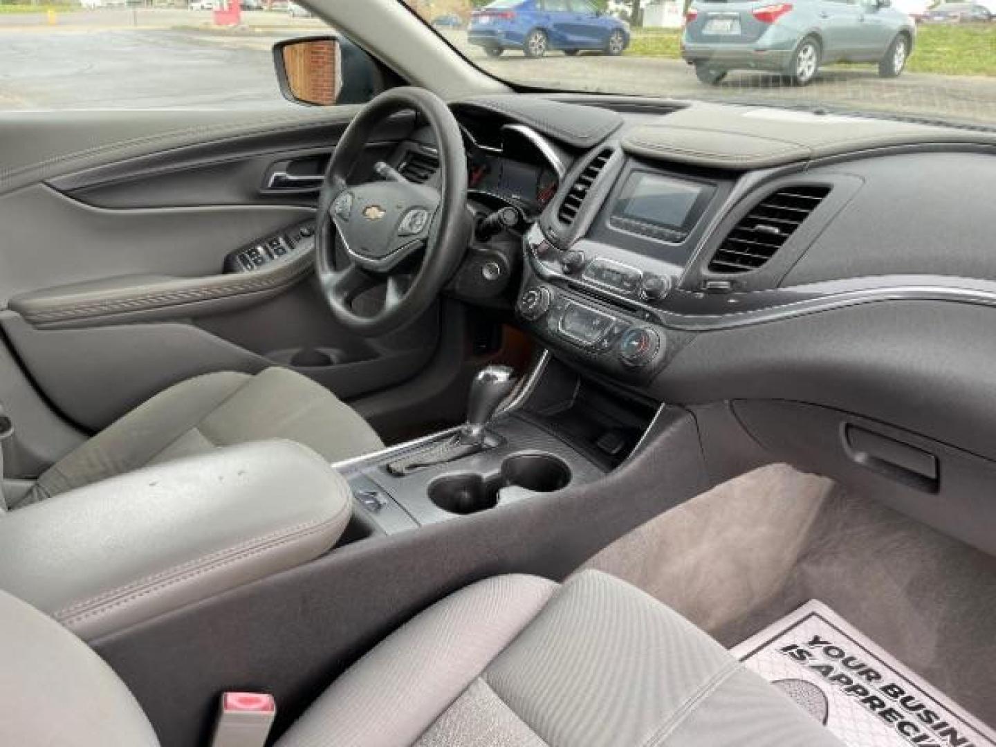 2015 Black Chevrolet Impala LS (2G11Z5SL6F9) with an 2.5L L4 DOHC 16V engine, 6-Speed Automatic transmission, located at 1099 N County Rd 25A , Troy, OH, 45373, (937) 908-9800, 40.057079, -84.212883 - Photo#8