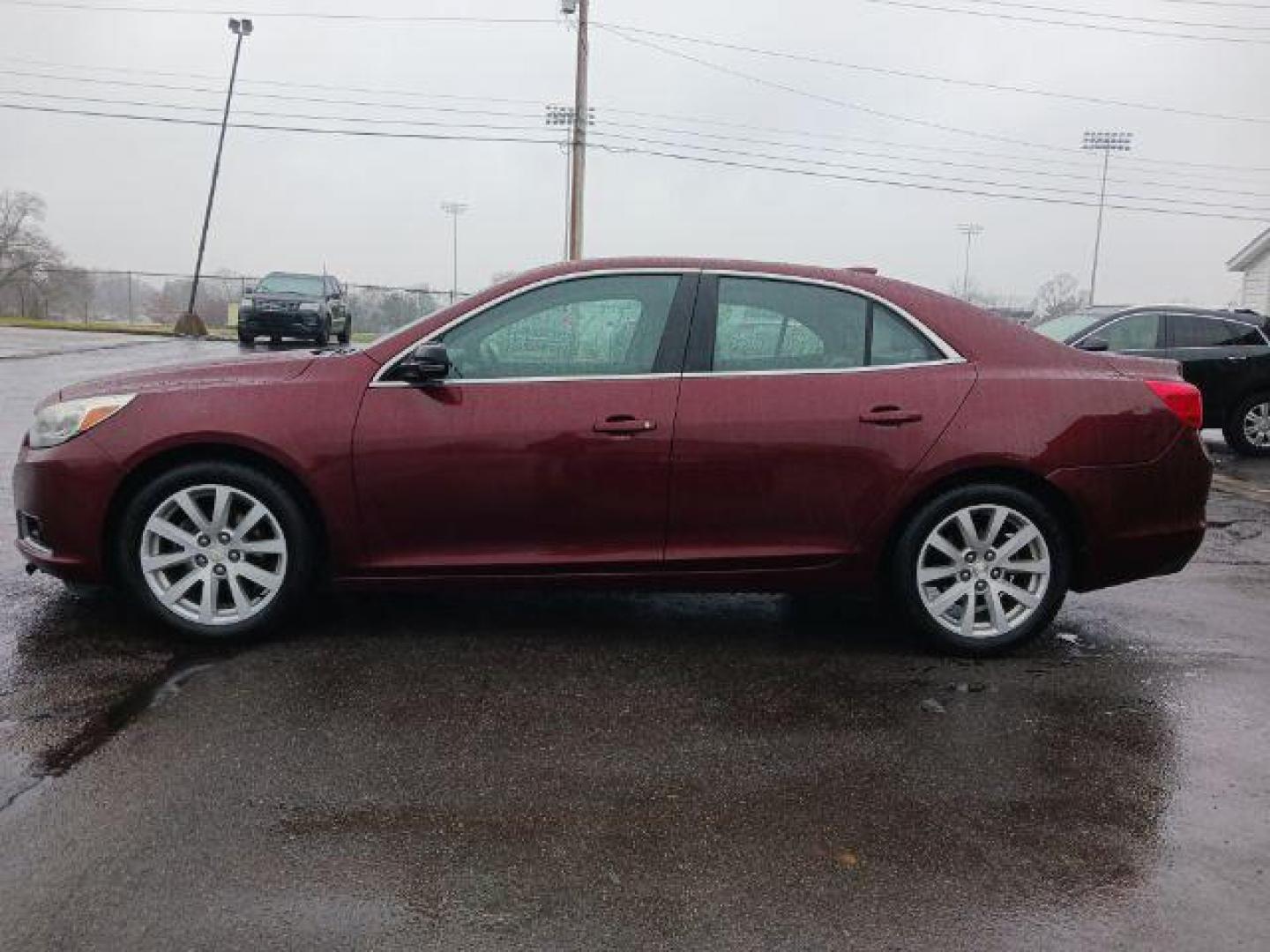 2015 Butte Red Metallic Chevrolet Malibu 2LT (1G11D5SL6FF) with an 2.5L L4 DOHC 16V engine, 6-Speed Automatic transmission, located at 401 Woodman Dr, Riverside, OH, 45431, (937) 908-9800, 39.760899, -84.123421 - Photo#3