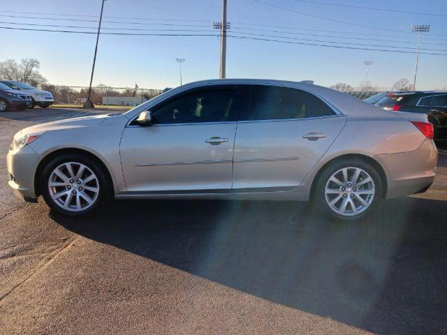 2015 Champagne Silver Metallic Chevrolet Malibu 2LT (1G11D5SL2FF) with an 2.5L L4 DOHC 16V engine, 6-Speed Automatic transmission, located at 1230 East Main St, Xenia, OH, 45385, (937) 908-9800, 39.688026, -83.910172 - Photo#3