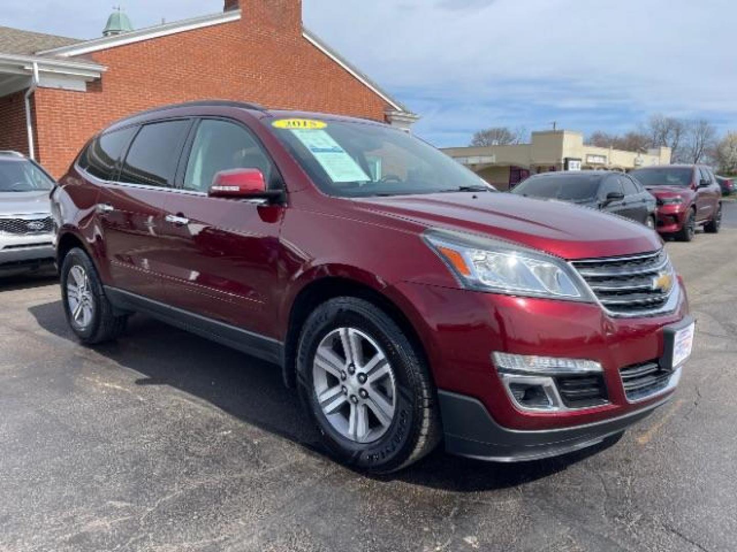 2015 Siren Red Tintcoat Chevrolet Traverse 2LT AWD (1GNKVHKD7FJ) with an 3.6L V6 DOHC 24V engine, 6-Speed Automatic transmission, located at 1099 N County Rd 25A , Troy, OH, 45373, (937) 908-9800, 40.057079, -84.212883 - Photo#0