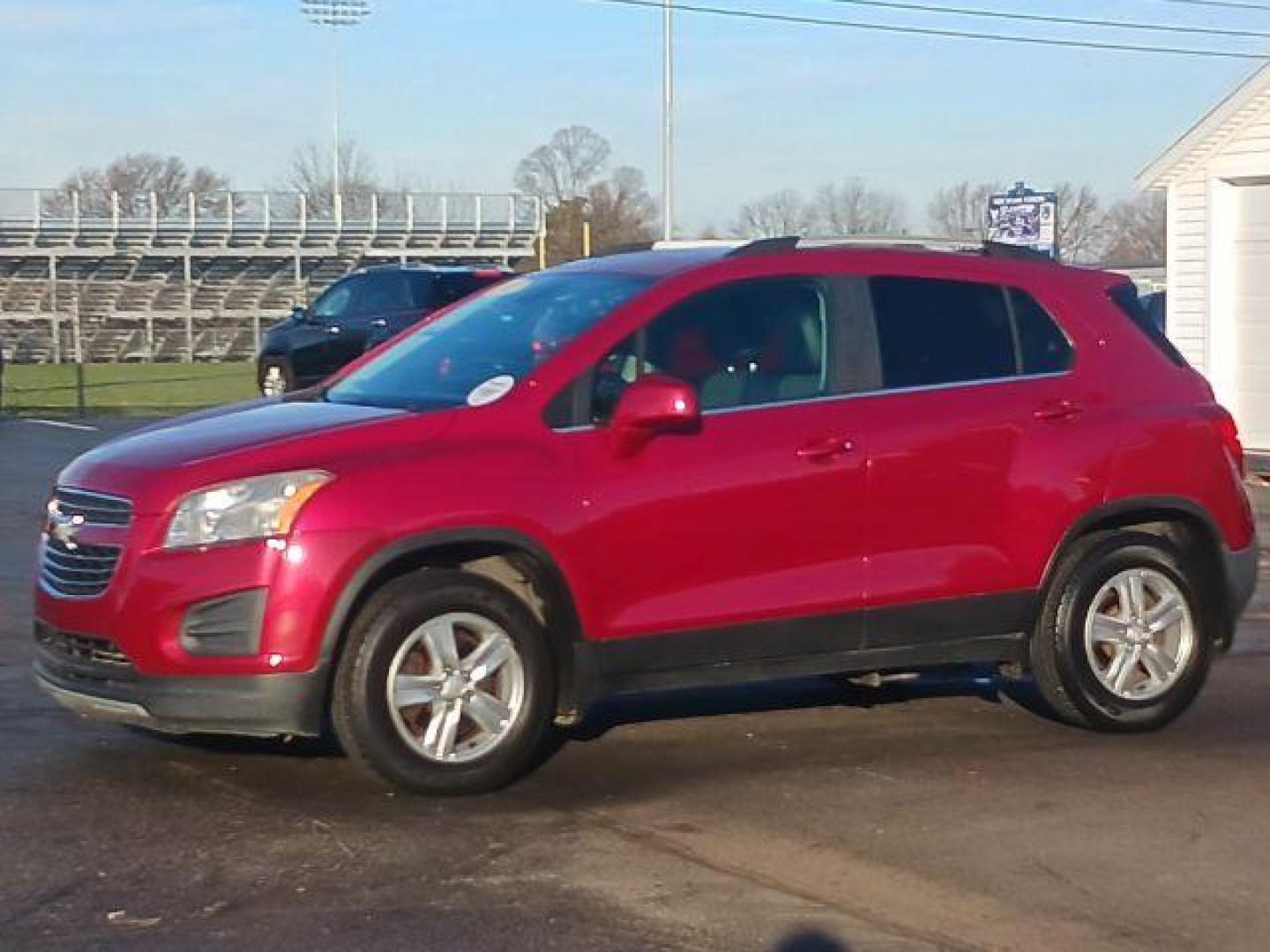 2015 Blaze Red Chevrolet Trax LT AWD (KL7CJRSB6FB) with an 1.4L L4 DOHC 16V engine, 6-Speed Automatic transmission, located at 880 E. National Road, Vandalia, OH, 45377, (937) 908-9800, 39.891918, -84.183594 - Photo#2