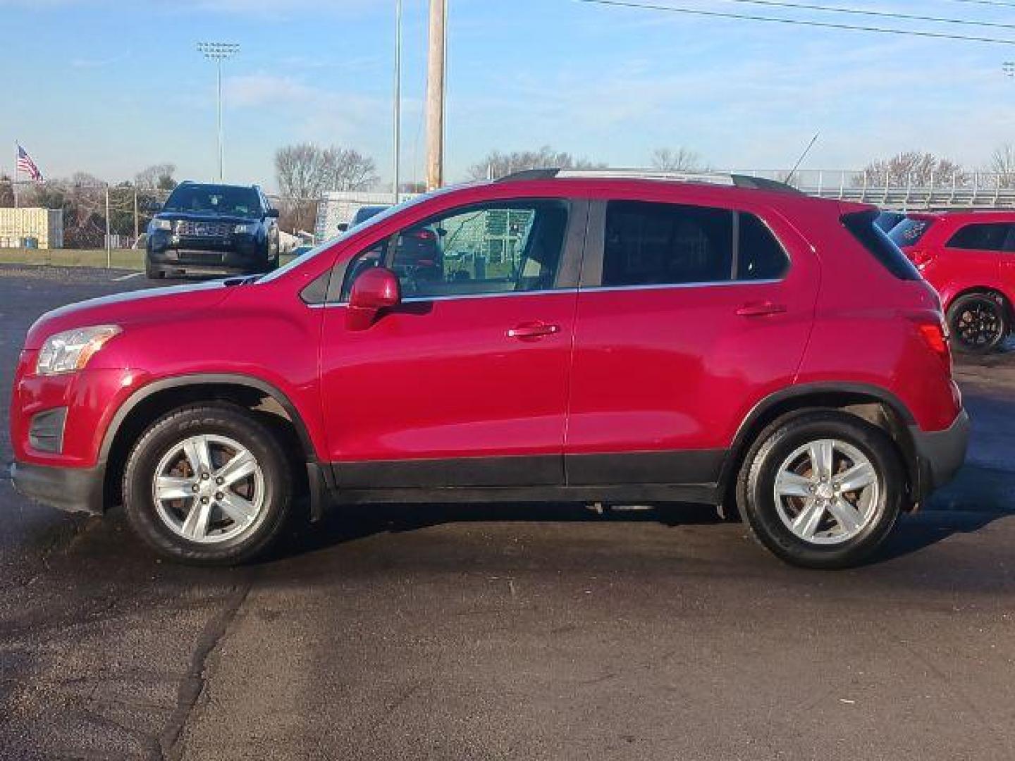 2015 Blaze Red Chevrolet Trax LT AWD (KL7CJRSB6FB) with an 1.4L L4 DOHC 16V engine, 6-Speed Automatic transmission, located at 880 E. National Road, Vandalia, OH, 45377, (937) 908-9800, 39.891918, -84.183594 - Photo#3