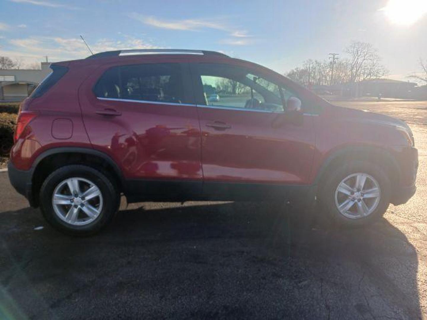 2015 Blaze Red Chevrolet Trax LT AWD (KL7CJRSB6FB) with an 1.4L L4 DOHC 16V engine, 6-Speed Automatic transmission, located at 880 E. National Road, Vandalia, OH, 45377, (937) 908-9800, 39.891918, -84.183594 - Photo#4