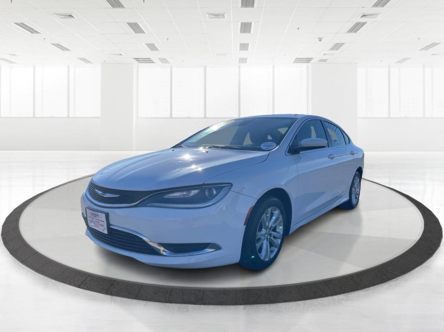 2015 Lunar White Tri-Coat Chrysler 200 Limited (1C3CCCAB1FN) with an 2.4L L4 DOHC 16V engine, 9-Speed Automatic transmission, located at 1184 Kauffman Ave, Fairborn, OH, 45324, (937) 908-9800, 39.807072, -84.030914 - Photo#7