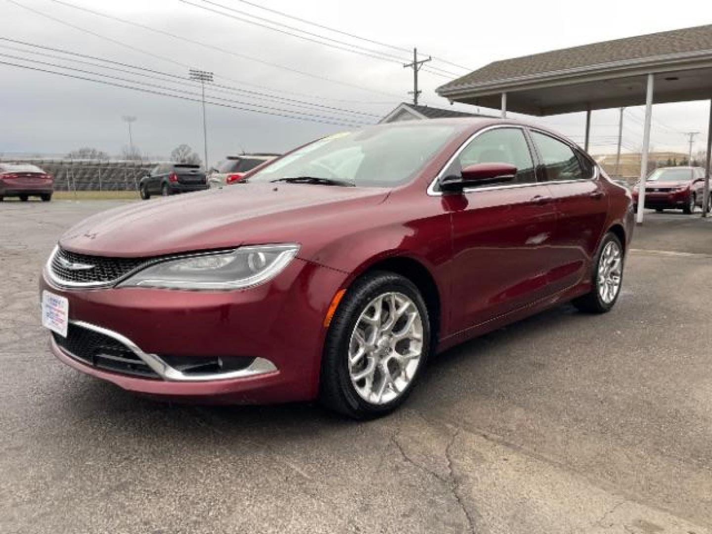 2015 Velvet Red Pearlcoat Chrysler 200 C AWD (1C3CCCEG1FN) with an 3.6L V6 DOHC 24V FFV engine, 9-Speed Automatic transmission, located at 4508 South Dixie Dr, Moraine, OH, 45439, (937) 908-9800, 39.689976, -84.218452 - Photo#1