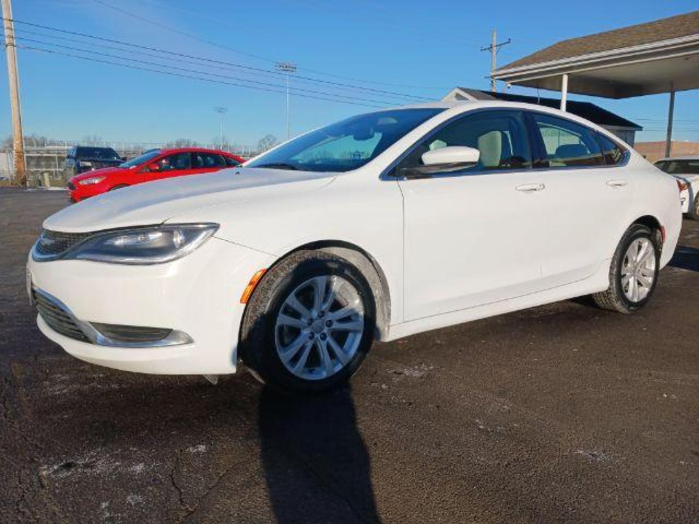 2015 Lunar White Tri-Coat Chrysler 200 Limited (1C3CCCAB9FN) with an 2.4L L4 DOHC 16V engine, 9-Speed Automatic transmission, located at 1951 S Dayton Lakeview Rd., New Carlisle, OH, 45344, (937) 908-9800, 39.890999, -84.050255 - Photo#2