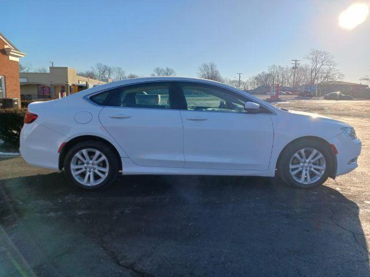 2015 Lunar White Tri-Coat Chrysler 200 Limited (1C3CCCAB9FN) with an 2.4L L4 DOHC 16V engine, 9-Speed Automatic transmission, located at 1951 S Dayton Lakeview Rd., New Carlisle, OH, 45344, (937) 908-9800, 39.890999, -84.050255 - Photo#4