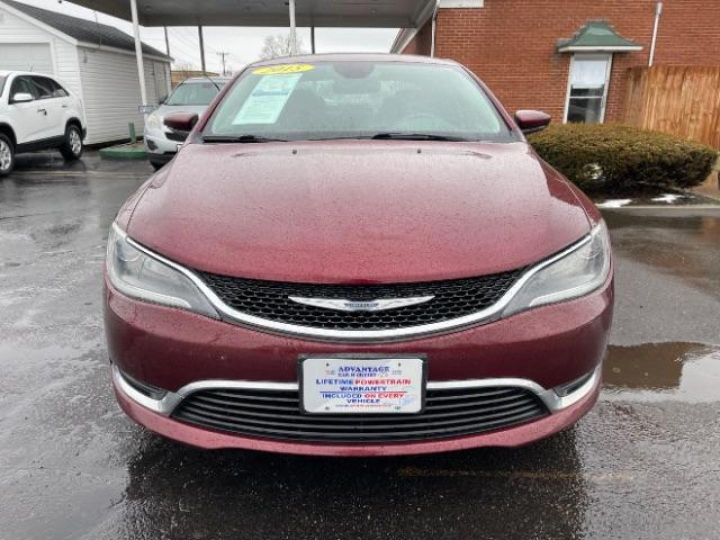 2015 Velvet Red Pearlcoat Chrysler 200 Limited (1C3CCCAB3FN) with an 2.4L L4 DOHC 16V engine, 9-Speed Automatic transmission, located at 401 Woodman Dr, Riverside, OH, 45431, (937) 908-9800, 39.760899, -84.123421 - Photo#2