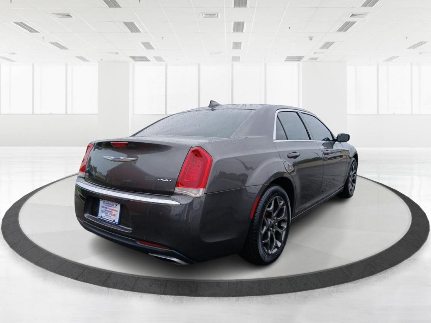 2015 Granite Crystal Metallic Clear Coat Chrysler 300 Limited AWD (2C3CCARG4FH) with an 3.6L V6 SOHC 24V engine, 8-Speed Automatic transmission, located at 8750 N County Rd 25A, Piqua, OH, 45356, (937) 908-9800, 40.164391, -84.232513 - Photo#2