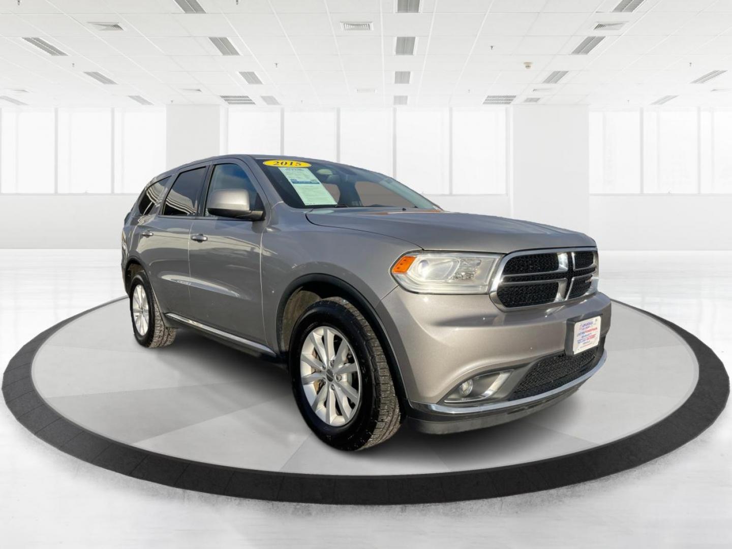 2015 Dodge Durango SXT AWD (1C4RDJAG2FC) with an 3.6L V6 DOHC 24V engine, 8-Speed Automatic transmission, located at 880 E. National Road, Vandalia, OH, 45377, (937) 908-9800, 39.891918, -84.183594 - Photo#0