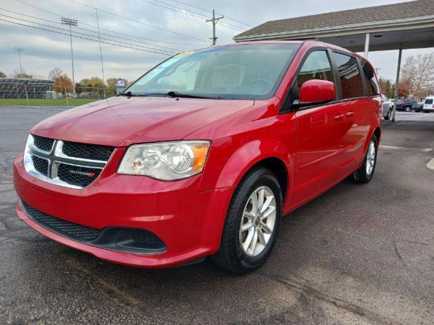 2015 Dp Cherry Red Crystal PC Dodge Grand Caravan SXT (2C4RDGCG1FR) with an 3.6L V6 DOHC 24V engine, 6-Speed Automatic transmission, located at 4508 South Dixie Dr, Moraine, OH, 45439, (937) 908-9800, 39.689976, -84.218452 - Photo#2