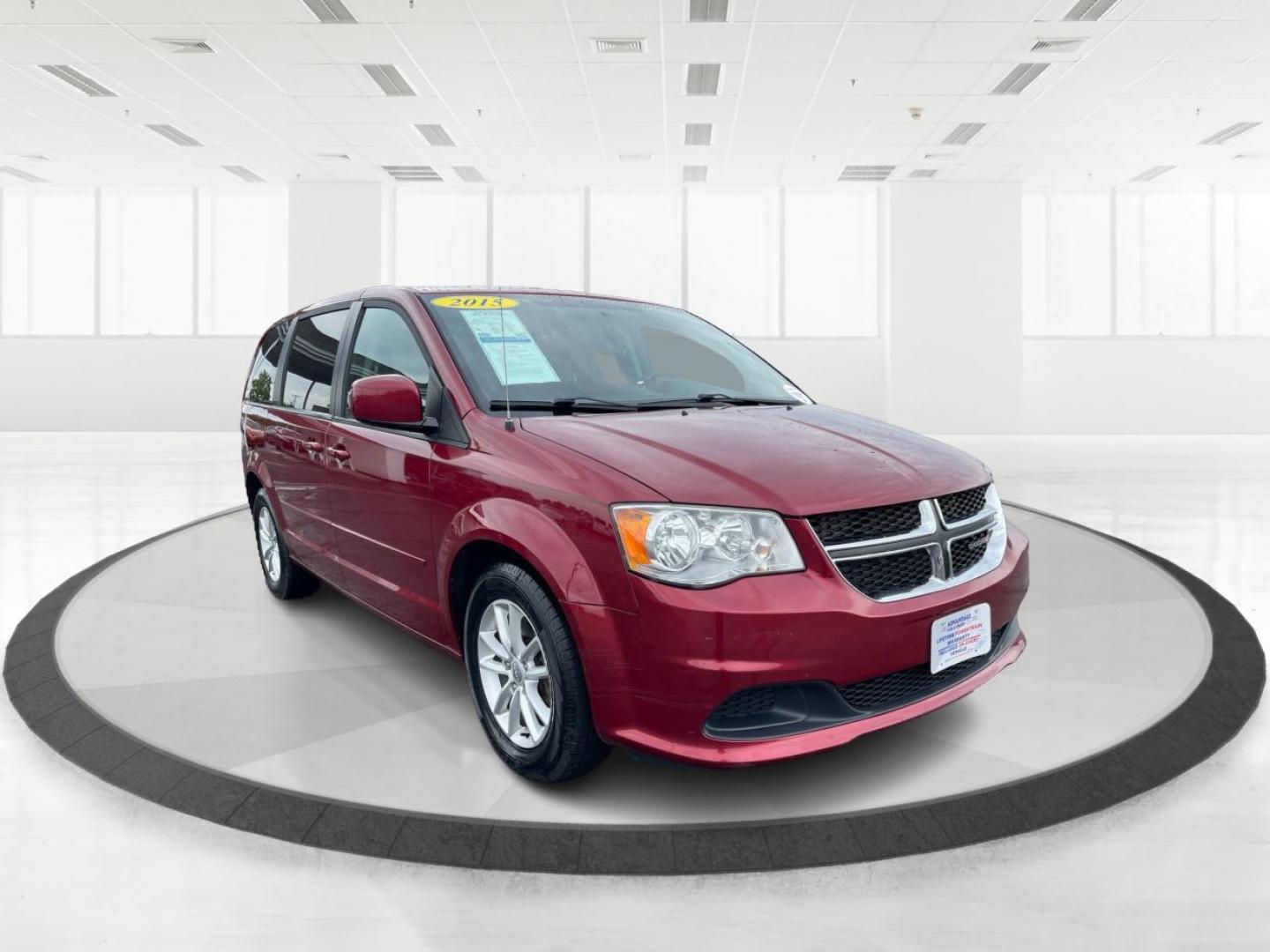 2015 Redline 2 Coat Pearl Dodge Grand Caravan (2C4RDGCG2FR) with an 3.6L V6 DOHC 24V engine, 6-Speed Automatic transmission, located at 401 Woodman Dr, Riverside, OH, 45431, (937) 908-9800, 39.760899, -84.123421 - Photo#0