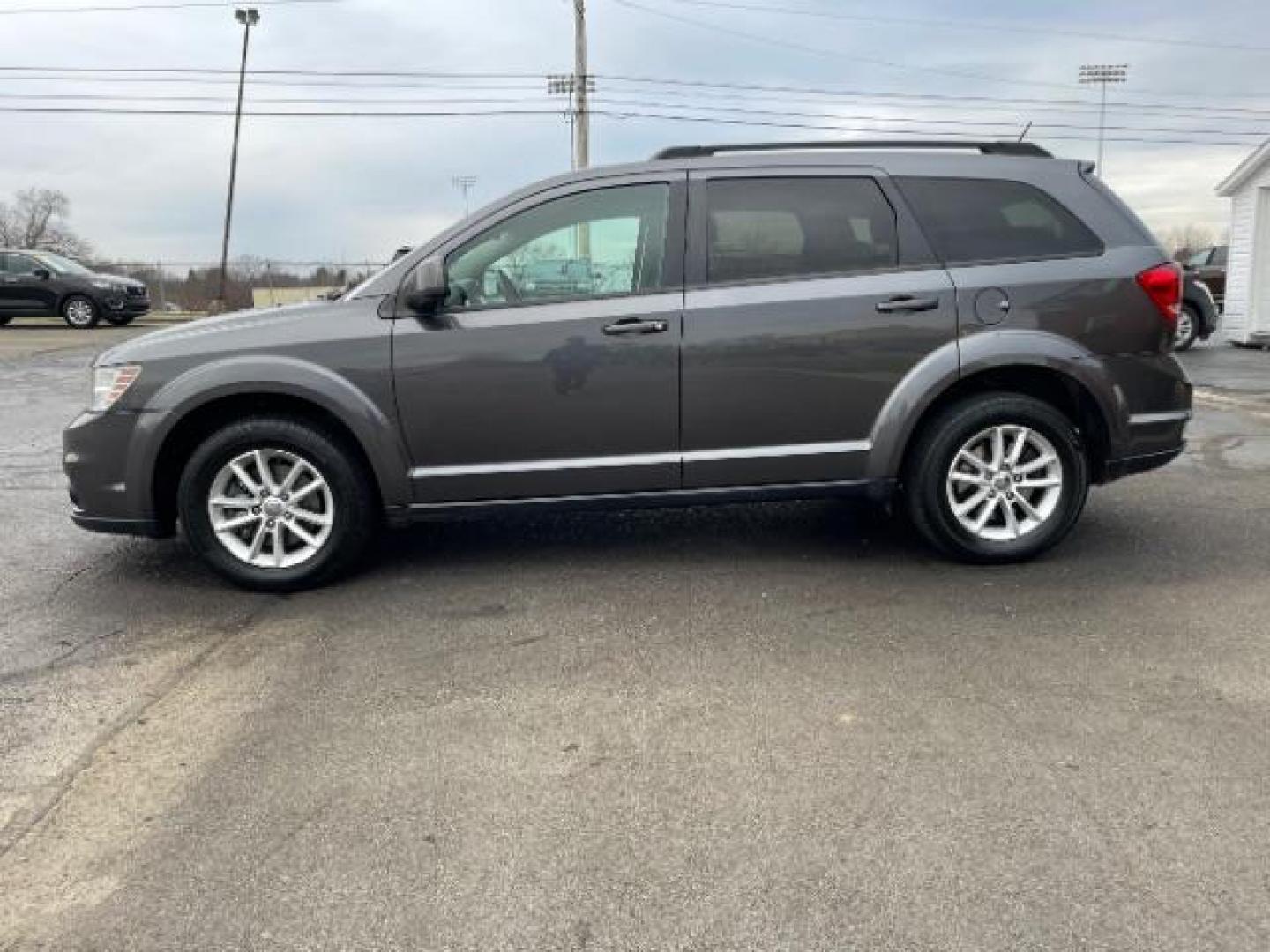 2015 Granite Crystal Met CC Dodge Journey SXT AWD (3C4PDDBG7FT) with an 3.6L V6 DOHC 24V engine, 6-Speed Automatic transmission, located at 1099 N County Rd 25A , Troy, OH, 45373, (937) 908-9800, 40.057079, -84.212883 - Photo#2