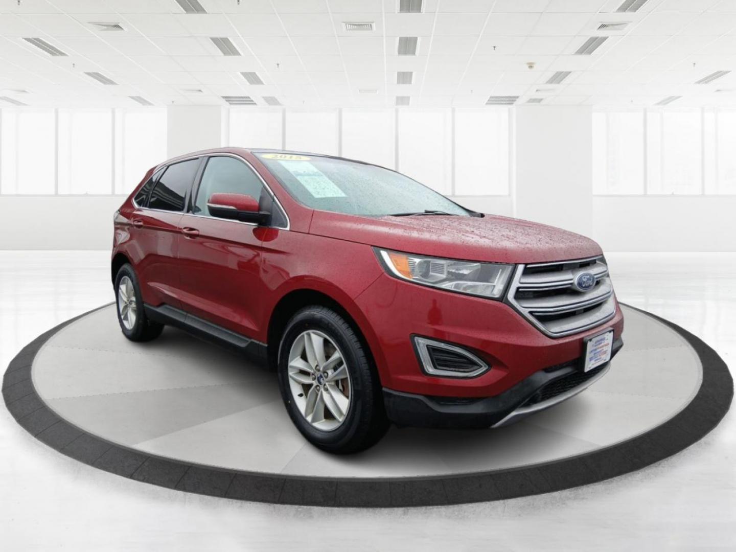 2015 Ruby Red Metallic Tinted Clearcoat Ford Edge SEL AWD (2FMTK4J84FB) with an 3.5L V6 DOHC 24V engine, 6-Speed Automatic transmission, located at 1099 N County Rd 25A , Troy, OH, 45373, (937) 908-9800, 40.057079, -84.212883 - Photo#0