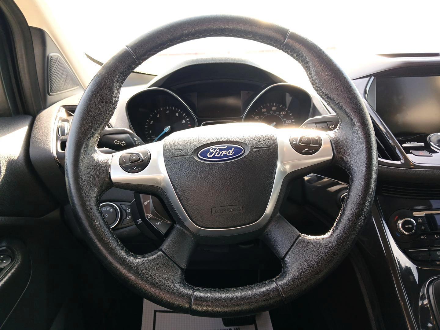 2015 Ford Escape Titanium 4WD (1FMCU9J93FU) with an 2.0L L4 DOHC 16V engine, 6-Speed Automatic transmission, located at 1951 S Dayton Lakeview Rd., New Carlisle, OH, 45344, (937) 908-9800, 39.890999, -84.050255 - 2015 Ford Escape Titanium 4WD - Photo#15