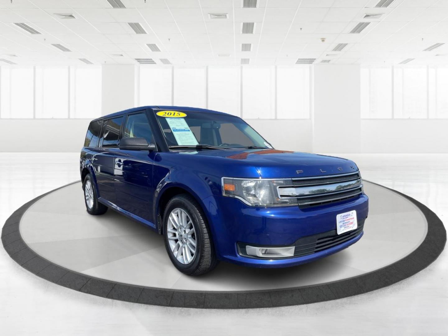 2015 Deep Impact Blue Metallic Ford Flex SEL AWD (2FMHK6C87FB) with an 3.5L V6 DOHC 24V engine, 6A transmission, located at 880 E. National Road, Vandalia, OH, 45377, (937) 908-9800, 39.891918, -84.183594 - Photo#0