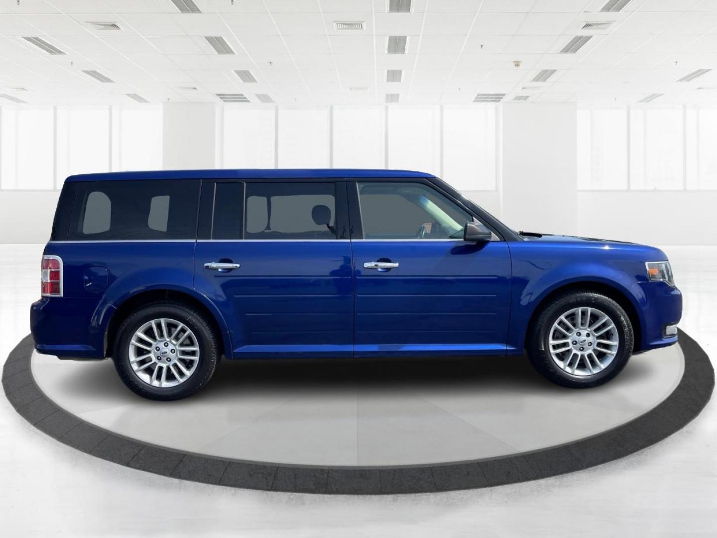 2015 Deep Impact Blue Metallic Ford Flex SEL AWD (2FMHK6C87FB) with an 3.5L V6 DOHC 24V engine, 6A transmission, located at 880 E. National Road, Vandalia, OH, 45377, (937) 908-9800, 39.891918, -84.183594 - Photo#1