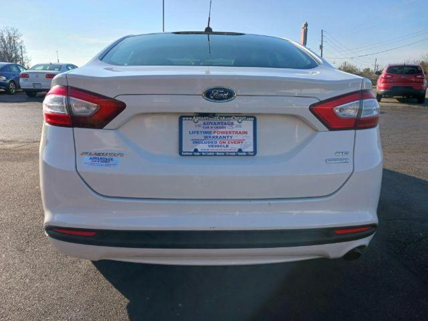 2015 White Platinum Met TC Ford Fusion SE (3FA6P0HD5FR) with an 1.5L L4 DOHC 16V engine, 6-Speed Automatic transmission, located at 1951 S Dayton Lakeview Rd., New Carlisle, OH, 45344, (937) 908-9800, 39.890999, -84.050255 - Photo#5