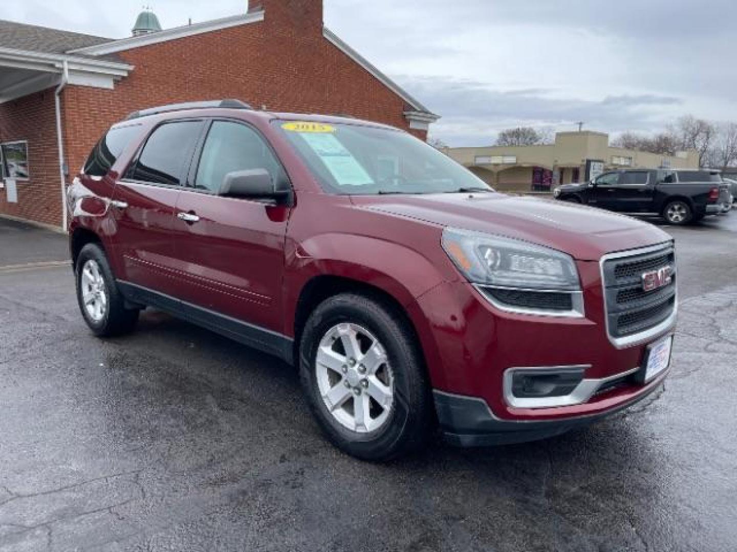 2015 Crimson Red Tincoat GMC Acadia SLE-2 AWD (1GKKVPKDXFJ) with an 3.6L V6 DOHC 24V engine, 6-Speed Automatic transmission, located at 1099 N County Rd 25A , Troy, OH, 45373, (937) 908-9800, 40.057079, -84.212883 - Photo#0