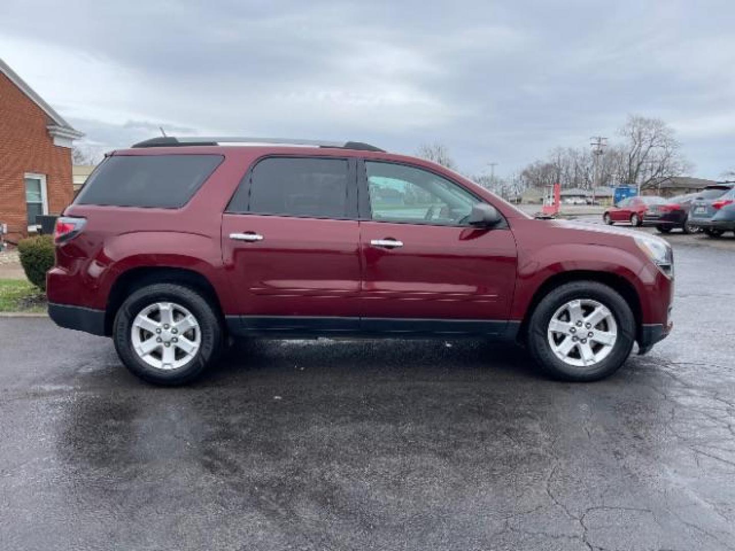 2015 Crimson Red Tincoat GMC Acadia SLE-2 AWD (1GKKVPKDXFJ) with an 3.6L V6 DOHC 24V engine, 6-Speed Automatic transmission, located at 1099 N County Rd 25A , Troy, OH, 45373, (937) 908-9800, 40.057079, -84.212883 - Photo#3