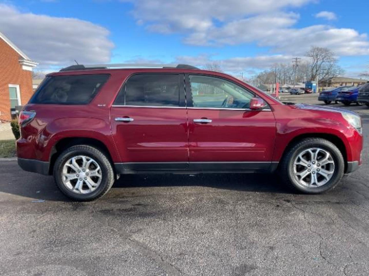 2015 Crimson Red Tincoat GMC Acadia SLT-1 FWD (1GKKRRKD7FJ) with an 3.6L V6 DOHC 24V engine, 6-Speed Automatic transmission, located at 4508 South Dixie Dr, Moraine, OH, 45439, (937) 908-9800, 39.689976, -84.218452 - Photo#4