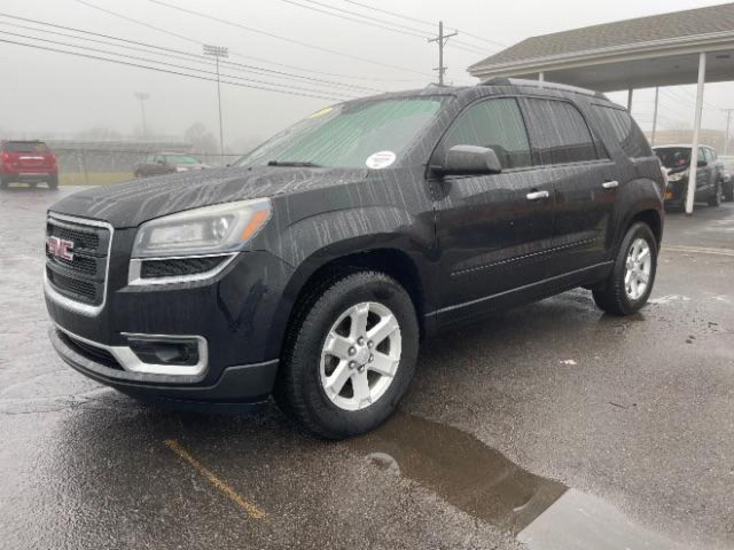 2015 Carbon Black Metallic GMC Acadia SLE-2 FWD (1GKKRPKD3FJ) with an 3.6L V6 DOHC 24V engine, 6-Speed Automatic transmission, located at 1099 N County Rd 25A , Troy, OH, 45373, (937) 908-9800, 40.057079, -84.212883 - Photo#1