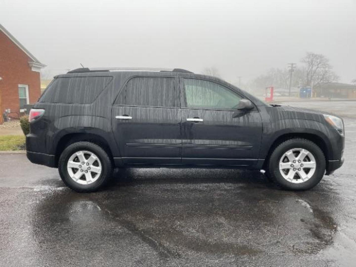 2015 Carbon Black Metallic GMC Acadia SLE-2 FWD (1GKKRPKD3FJ) with an 3.6L V6 DOHC 24V engine, 6-Speed Automatic transmission, located at 1099 N County Rd 25A , Troy, OH, 45373, (937) 908-9800, 40.057079, -84.212883 - Photo#2