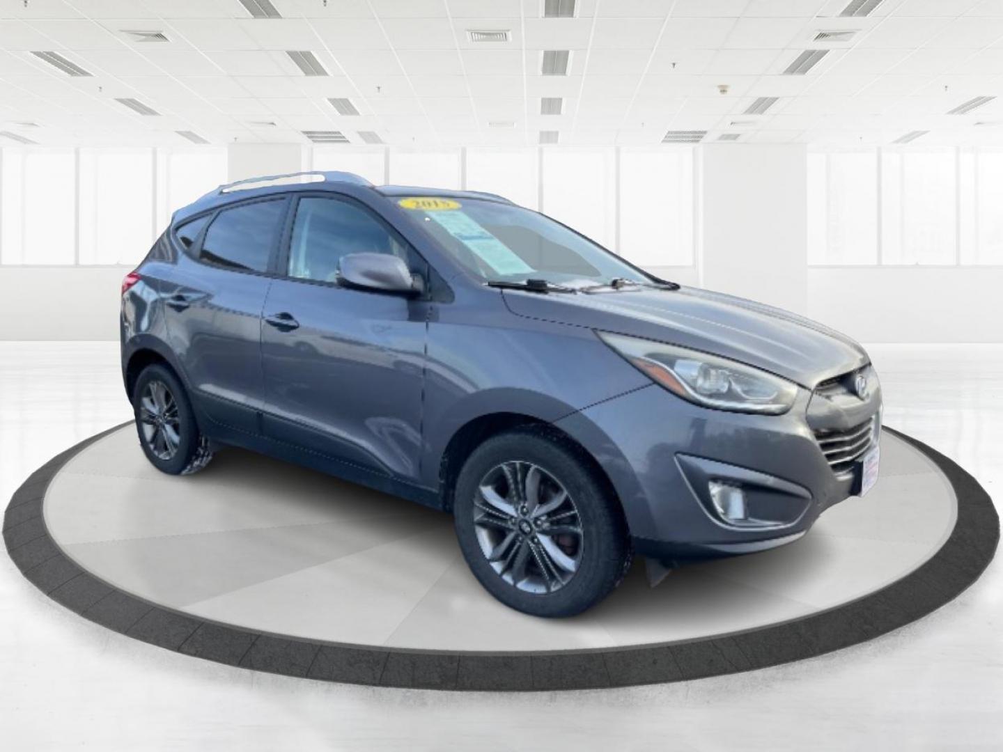 2015 Graphite Gray Metallic Hyundai Tucson (KM8JUCAG4FU) with an 2.4L L4 DOHC 16V engine, 6-Speed Automatic transmission, located at 1230 East Main St, Xenia, OH, 45385, (937) 908-9800, 39.688026, -83.910172 - Photo#0