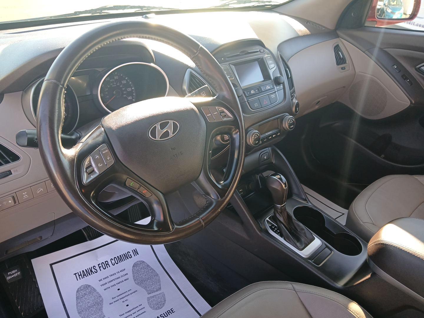 2015 Garnet Red Mica Hyundai Tucson GLS AWD (KM8JUCAG4FU) with an 2.4L L4 DOHC 16V engine, 6-Speed Automatic transmission, located at 1099 N County Rd 25A , Troy, OH, 45373, (937) 908-9800, 40.057079, -84.212883 - Photo#7