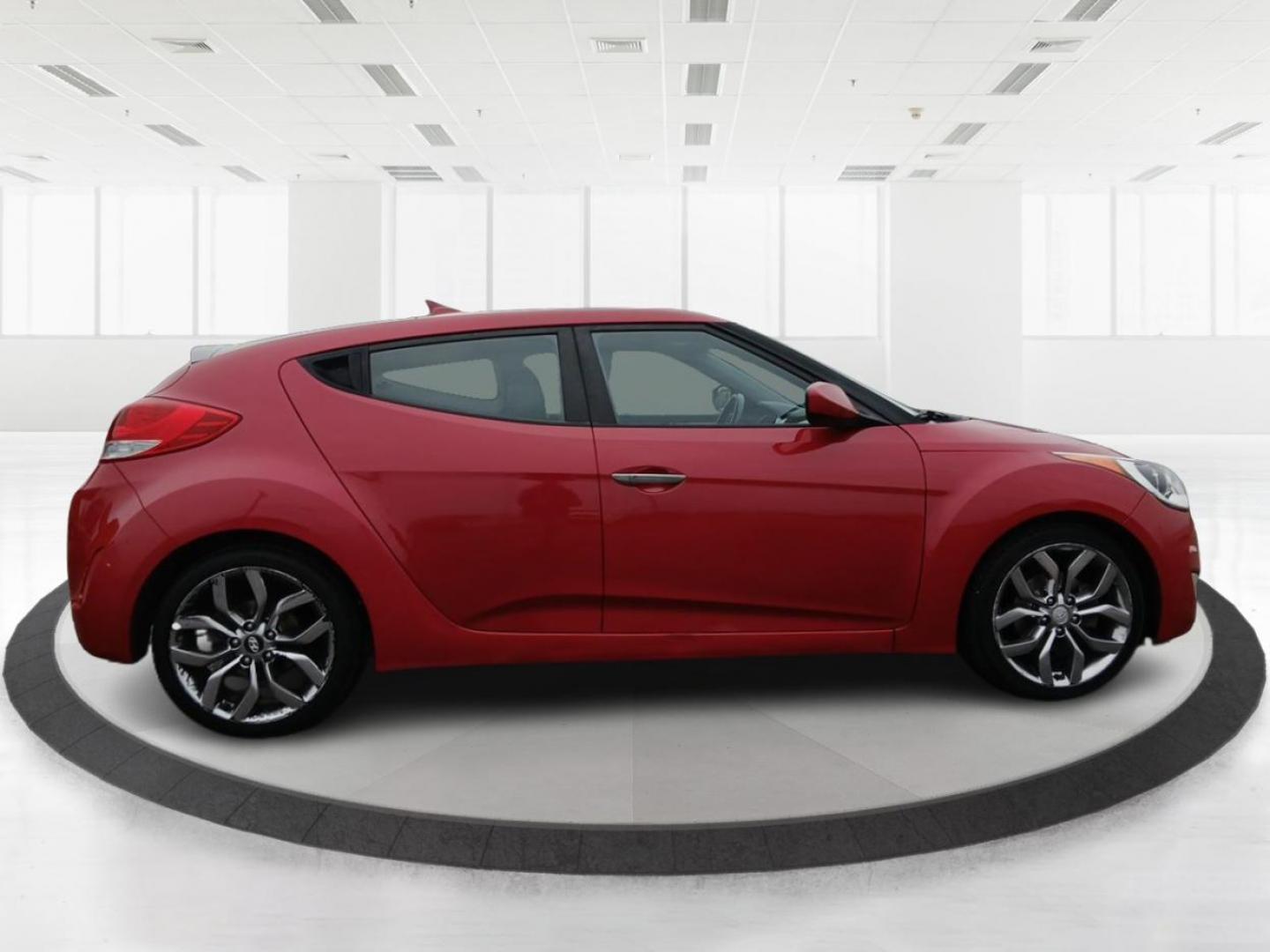 2015 Boston Red Metallic Hyundai Veloster Base 6MT (KMHTC6AD1FU) with an 1.6L L4 DOHC 16V engine, 6-Speed Manual transmission, located at 1099 N County Rd 25A , Troy, OH, 45373, (937) 908-9800, 40.057079, -84.212883 - Photo#1